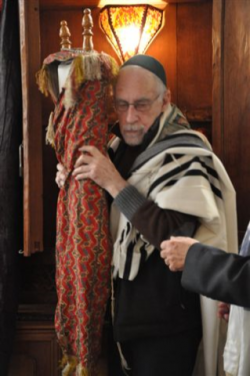 Nikos Stavroulakis with the MST during a service after the 2010 arson attack