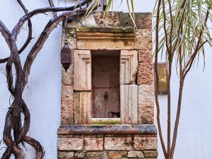 This stone fountain is set in the east wall of the northern courtyard.